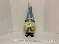 gnome with green watering can yard ornament