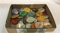 Tray of Associated gun club pins dating back to