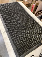 Large floor mat approximately  48”x 24”