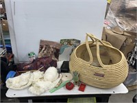 Wicker basket of crochet and craft materials