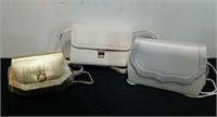 Three small vintage purses