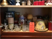 contents of cabinet, candles, candle holders, etc