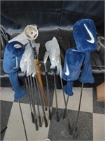 Vintage assorted golf club, ball retriever, and