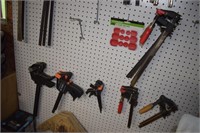 Sixteen Clamps & Set of Pads for Clamps