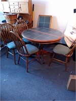 Table with 4 chairs and leaf