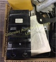 Box of electrical supplies. Breakers outlets...