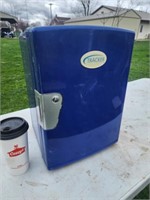 Tracker compact 12 volt fridge works.