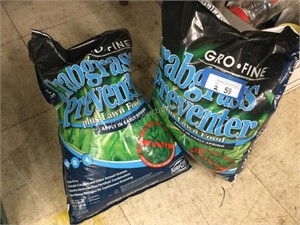 Two bags of crab grass preventer