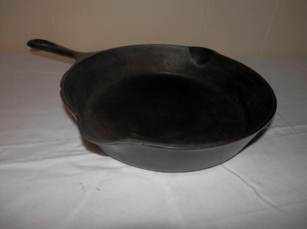 One-# 6 cast iron  skillet-knick on side