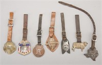Collection of seven advertising Watch Fobs