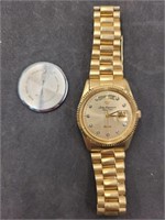 Jules Jurgensen gold toned watch, needs repair,