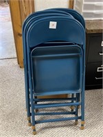 set of 4 blue folding chairs