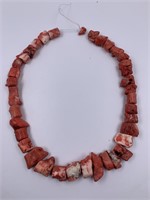 32" strand of large coral beads            (P 22)