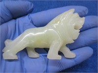 hand carved glass lion figurine (possibly jade)