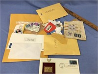 large lot of stamps and one gold first day issue,