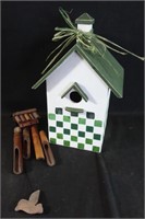 Birdhouse with wooden wind chimes