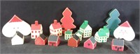 Assorted wooden miniature houses, two trees and