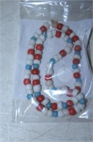 STRAND OF WHITE, RED & BLUE PADRE TRADE BEADS