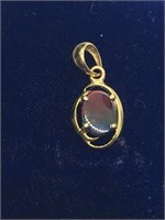 14k gold ammolite pendant valued at $35
