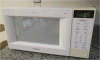 Samsung model MW5490W microwave.