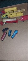 Lot with mini train set Simi trucks and a fire