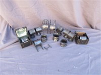GROUP OF SILVER PLATE NAPKIN HOLDERS INCLUDING