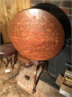 Ornate marquetry tilt top table one foot is broke