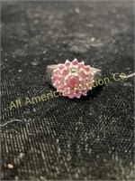 Sterling silver ring with pink stones setting