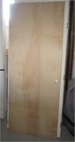 Heavy interior wood door. Measures 80" x 31.75".