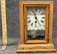 Oak cased shelf clock