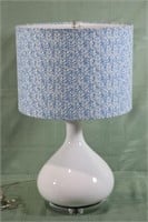 White pottery bulbous lamp on Lucite base with blu