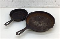 2 cast-iron, frying pans