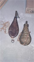 Black powder pouches 1 leather has damage 1 metal