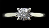 10K White gold diamond solitaire ring in cathedral