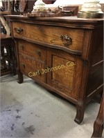 CURVED FRONT OAK COMMODE