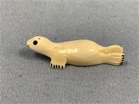Small ivory carving of a seal by Utuqsiq 2.5"