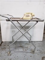 Vintage phone and rolling cart