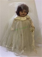 Antique doll on stand - either a wedding doll or