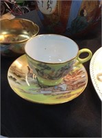 Yellow Asian cup and saucer