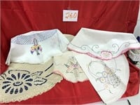 5 Assorted Round Embroidered Tableclothes