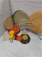 Tupperware lids and handles misc.