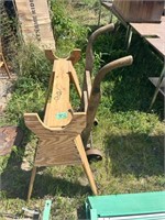 Saddle rack and antique cart