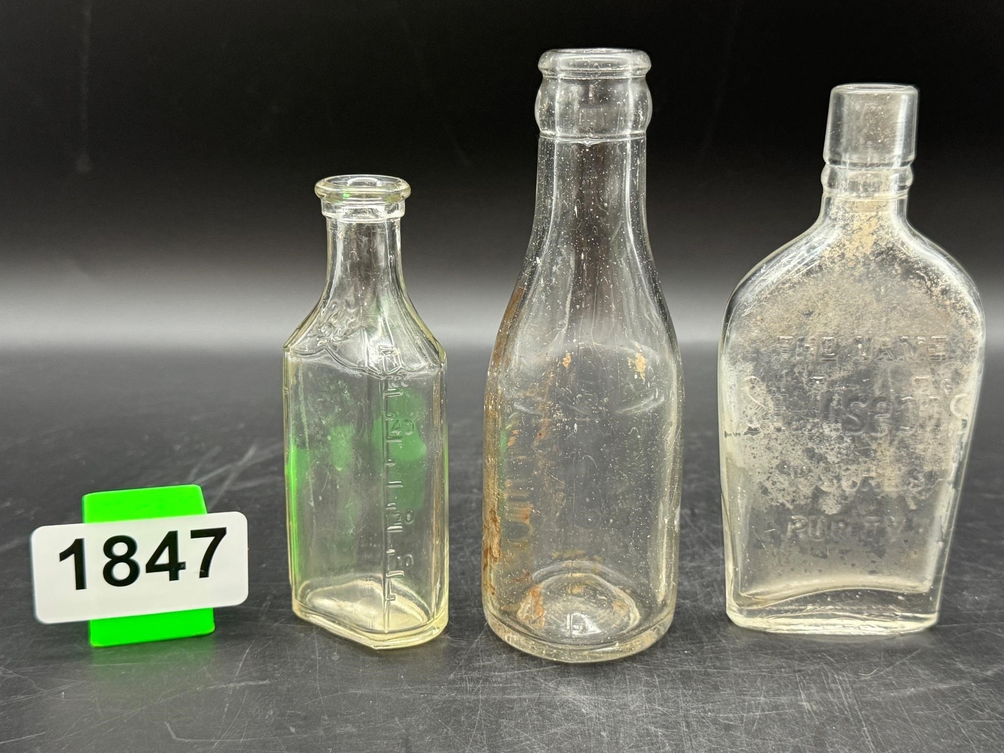 3 Vintage glass bottles 1 embossed
