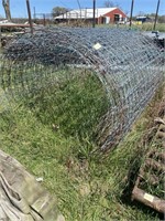 Large roll of wire fence 6 foot tall.