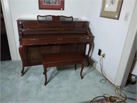 Gorgeous Baldwin piano and seat with storage.