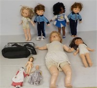 Assortment of dolls Fisher Price and others.