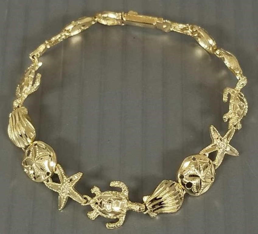 14 gold sea life motif bracelet - 10 grams