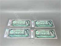 4 Canadian $1.00 bills 1967 - crips in sleeves
