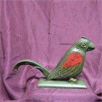 Antique cast iron parrot nut cracker.