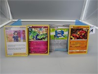 Four Assorted Pokemon Cards